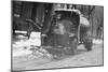 Tank Truck with Snow Plow Cleans the Streets-null-Mounted Art Print