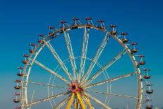 Big Wheel with Multicolored Cabins in Amusement Park-tarczas-Photographic Print