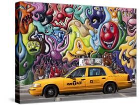 Taxi and mural painting in Soho, NYC-Michel Setboun-Stretched Canvas