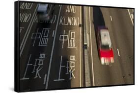 Taxi Driving in Central District, Hong Kong, China-Paul Souders-Framed Stretched Canvas