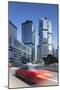 Taxi Passing Along Street, Admiralty, Hong Kong Island, Hong Kong-Ian Trower-Mounted Photographic Print