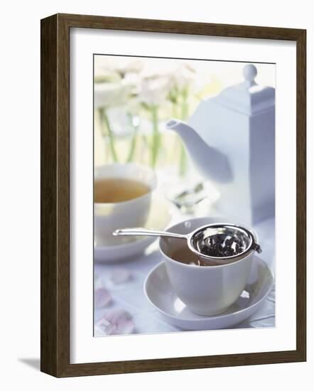 Tea Strainer on Cup of Tea-Jean Francois Hamon-Framed Photographic Print