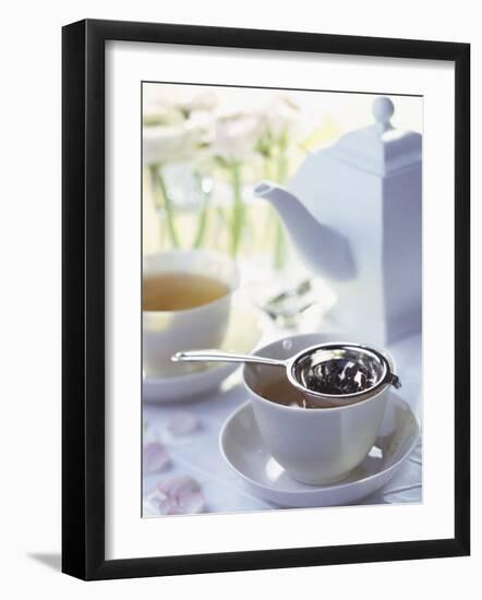 Tea Strainer on Cup of Tea-Jean Francois Hamon-Framed Photographic Print