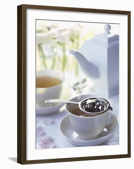Tea Strainer on Cup of Tea-Jean Francois Hamon-Framed Photographic Print