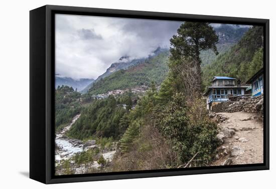 Teahouses along a trail next to river.-Lee Klopfer-Framed Stretched Canvas