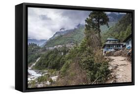 Teahouses along a trail next to river.-Lee Klopfer-Framed Stretched Canvas