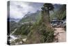 Teahouses along a trail next to river.-Lee Klopfer-Stretched Canvas