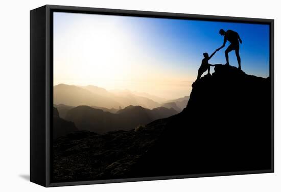 Teamwork Couple Hiking Helping Hand-blas-Framed Stretched Canvas