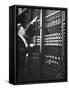 Technician Manipulating 1 of Hundreds of Dials on Panel of IBM's Room Size Eniac Computer-Francis Miller-Framed Stretched Canvas