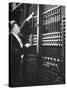 Technician Manipulating 1 of Hundreds of Dials on Panel of IBM's Room Size Eniac Computer-Francis Miller-Stretched Canvas