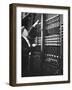 Technician Manipulating 1 of Hundreds of Dials on Panel of IBM's Room Size Eniac Computer-Francis Miller-Framed Photographic Print