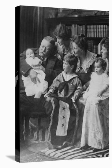 Teddy Roosevelt Holds a Baby in His Arms in a Family Portrait-null-Stretched Canvas