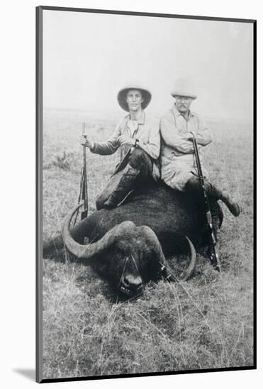 Teddy Roosevelt Sitting on Dead Water Buffalo with Rifle-null-Mounted Photographic Print