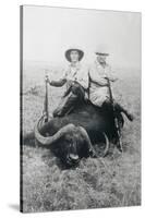Teddy Roosevelt Sitting on Dead Water Buffalo with Rifle-null-Stretched Canvas