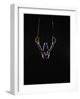 Teenage (16-17) Male Gymnast Practicing on Rings against Black Background-Thomas Barwick-Framed Photographic Print