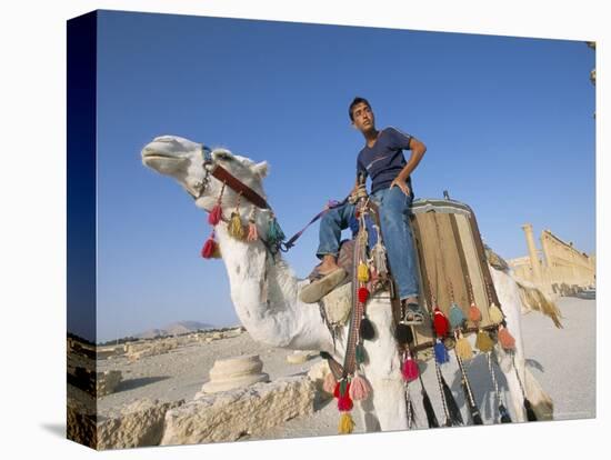 Teenage Boy on Camel in Front of the Great Colonnade, Palmyra, Syria, Middle East-Alison Wright-Stretched Canvas