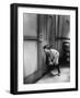 Teenage Boy Peeping Through Keyhole-null-Framed Photo