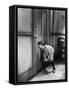 Teenage Boy Peeping Through Keyhole-null-Framed Stretched Canvas