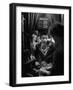 Teenage Boy Peering Into Window of Ticket Booth at a Movie Theater-Yale Joel-Framed Photographic Print