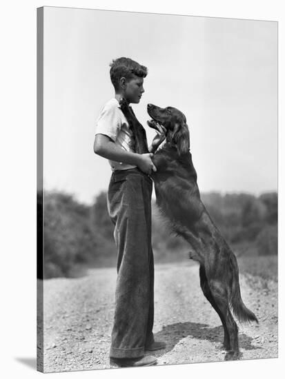 Teenage Boy with Irish Setter-Philip Gendreau-Stretched Canvas