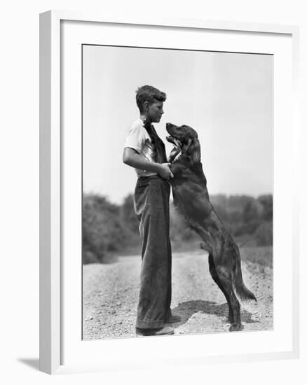 Teenage Boy with Irish Setter-Philip Gendreau-Framed Photographic Print