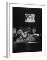 Teenage Couple Necking in a Movie Theater-Nina Leen-Framed Photographic Print