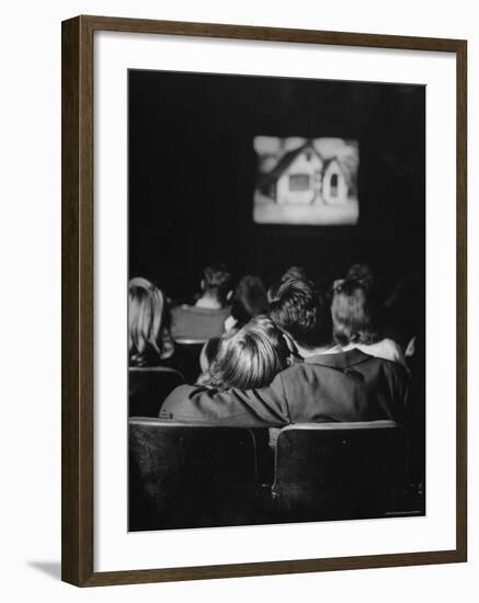 Teenage Couple Necking in a Movie Theater-Nina Leen-Framed Photographic Print