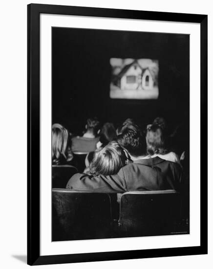 Teenage Couple Necking in a Movie Theater-Nina Leen-Framed Photographic Print