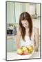 Teenage Girl Cutting Apples, Portrait, Healthy Nutrition-Axel Schmies-Mounted Photographic Print