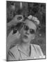 Teenage Girl Having Nail Polish Touches Added to Her Sunglasses-Nina Leen-Mounted Photographic Print
