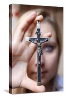 Teenage girl holding a crucifix, Saint Gervais, Haute Savoie, france-Godong-Stretched Canvas