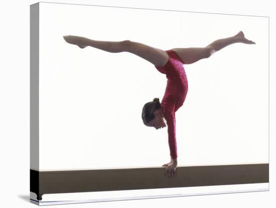 Teenage Girl on a Balance Beam-null-Stretched Canvas