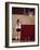 Teenage Girl Practicing Basketball Indoors-null-Framed Photographic Print