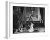 Teenage Girl Reading Book with Christmas Tree-null-Framed Photo