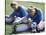 Teenage Girls in Soccer Uniforms Doing Stretching Exercises-null-Stretched Canvas