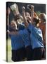 Teenage Girls on a Soccer Team Celebrating-null-Stretched Canvas