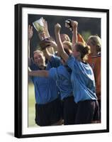 Teenage Girls on a Soccer Team Celebrating-null-Framed Premium Photographic Print