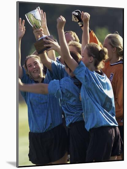Teenage Girls on a Soccer Team Celebrating-null-Mounted Photographic Print