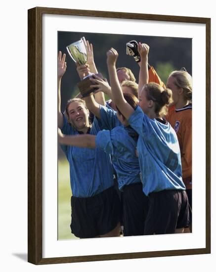 Teenage Girls on a Soccer Team Celebrating-null-Framed Photographic Print