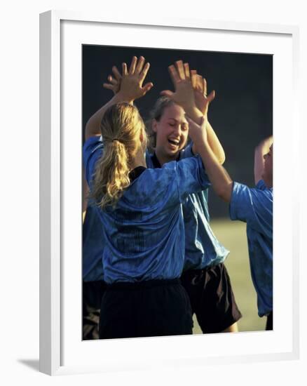 Teenage Girls on a Soccer Team Celebrating-null-Framed Photographic Print