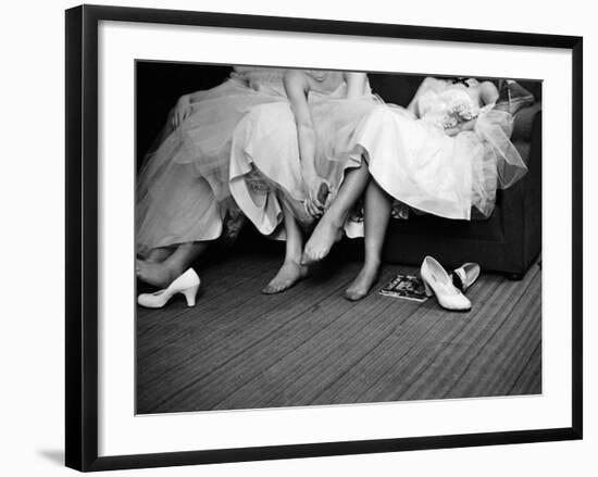 Teenage Girls Resting Feet at First Formal Dance at the Naval Armory-Cornell Capa-Framed Photographic Print