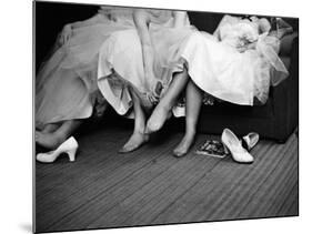 Teenage Girls Resting Feet at First Formal Dance at the Naval Armory-Cornell Capa-Mounted Photographic Print