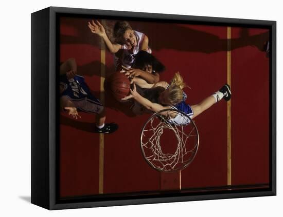 Teenage Girs Playing High School Basketball-null-Framed Stretched Canvas