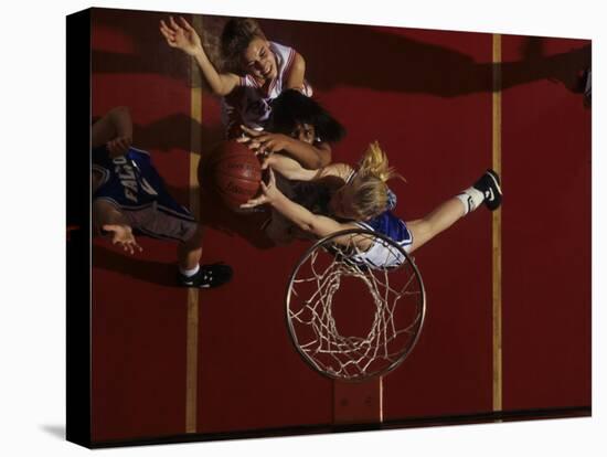 Teenage Girs Playing High School Basketball-null-Stretched Canvas