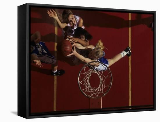 Teenage Girs Playing High School Basketball-null-Framed Stretched Canvas