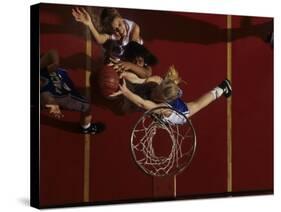 Teenage Girs Playing High School Basketball-null-Stretched Canvas