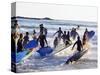 Teenage Surfers Running with Their Boards Towards the Water at a Life Saving Competition-Yadid Levy-Stretched Canvas