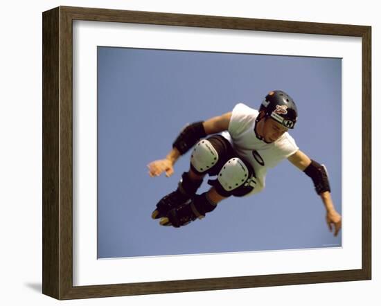 Teenager Inline Skating in Mid-Air-null-Framed Premium Photographic Print