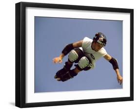 Teenager Inline Skating in Mid-Air-null-Framed Premium Photographic Print