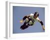 Teenager Inline Skating in Mid-Air-null-Framed Premium Photographic Print